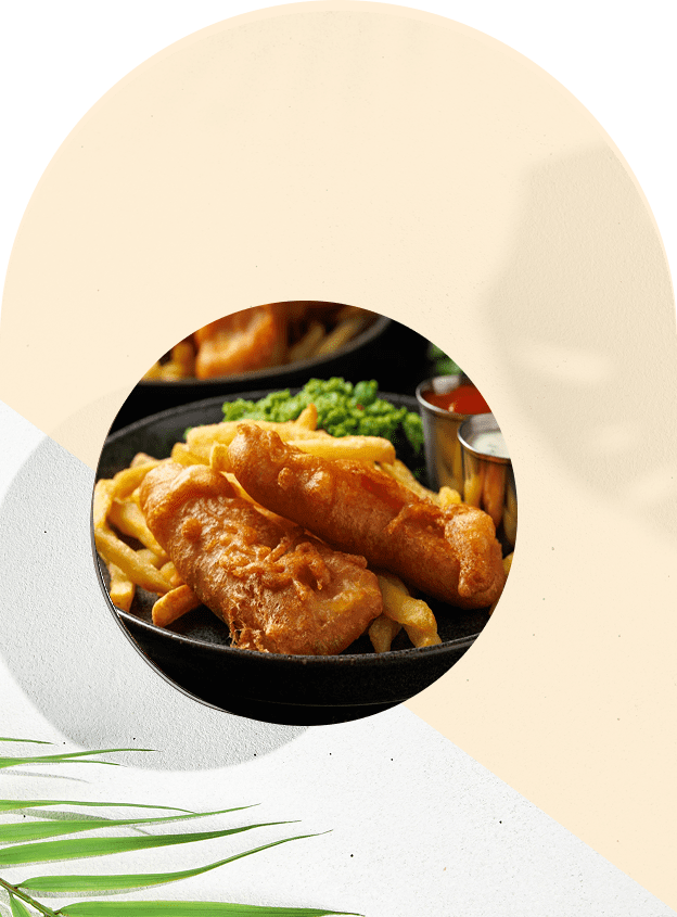 Fish and chips with broccoli and dip.